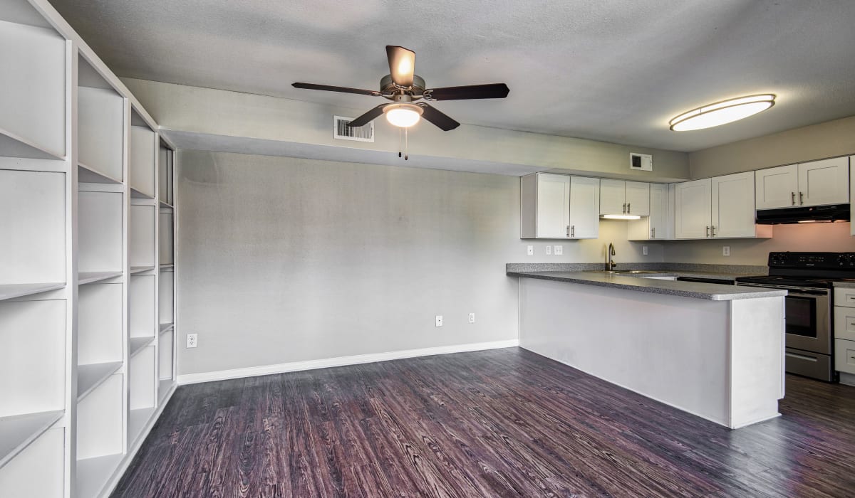 Apartment living room with hardwood flooring at Latitude 2976 in Houston, Texas