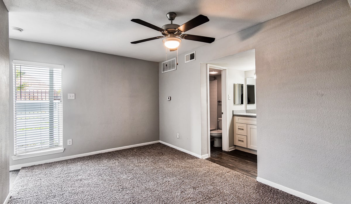 Apartment with hardwood and carpet flooring at Latitude 2976 in Houston, Texas