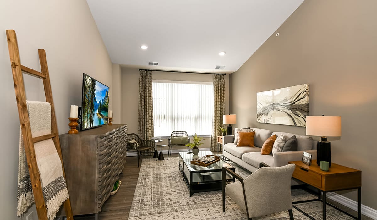 Living room with modern details at Encore at Manchester in Novi, Michigan