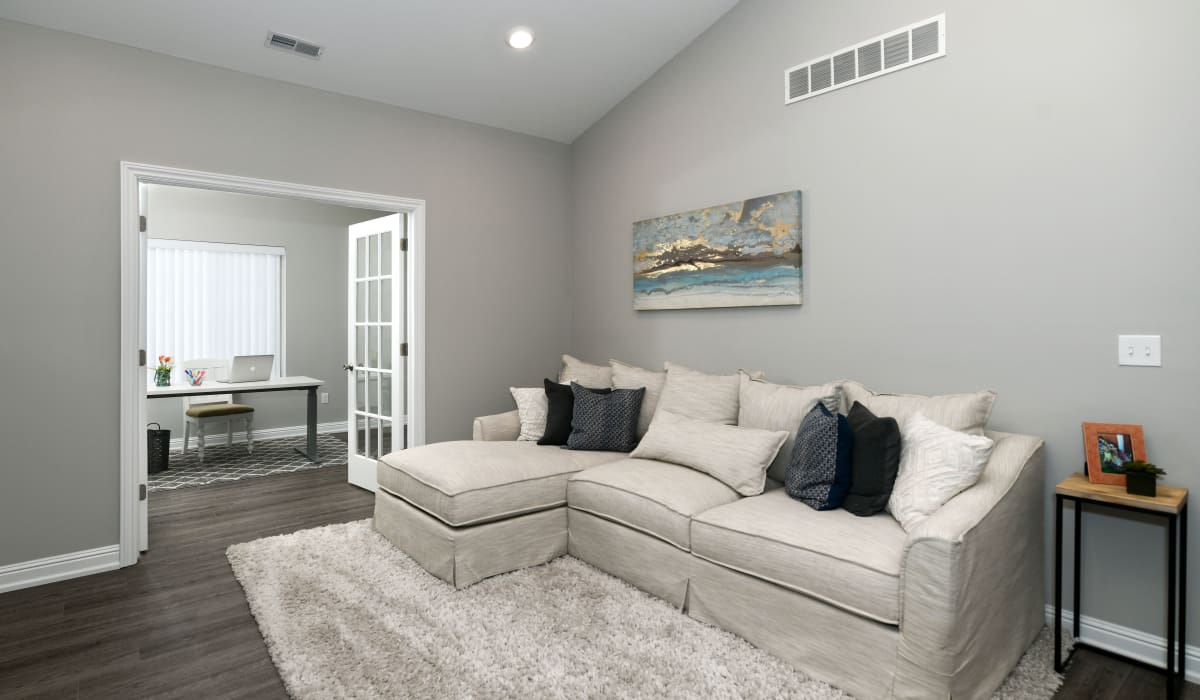 Living room with a nice couch at Encore Townhomes in Utica, Michigan