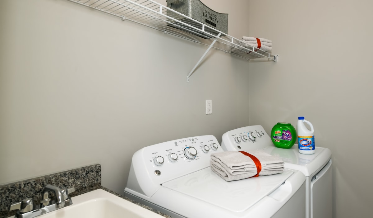 Laundry room with ample space at Encore Townhomes in Utica, Michigan
