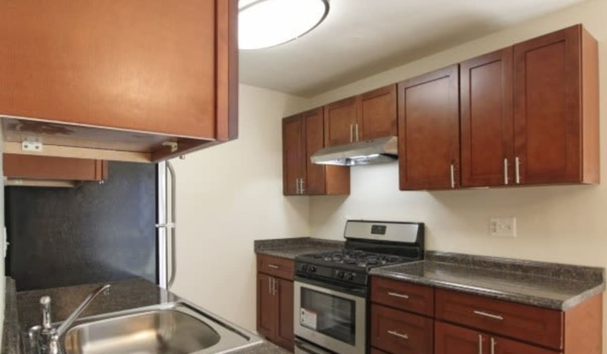 Hallway apartment kitchen at Chelsea Park in Gaithersburg, Maryland