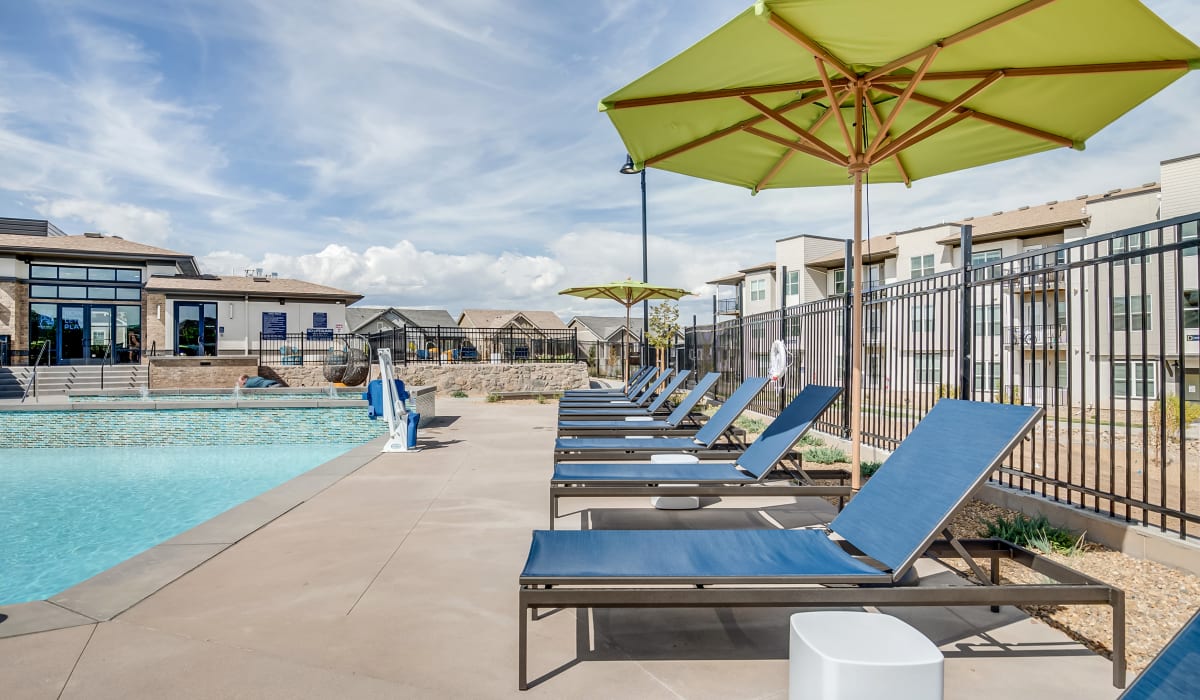 Lounge seating near the pool at The Wright Apartments in Centennial, Colorado