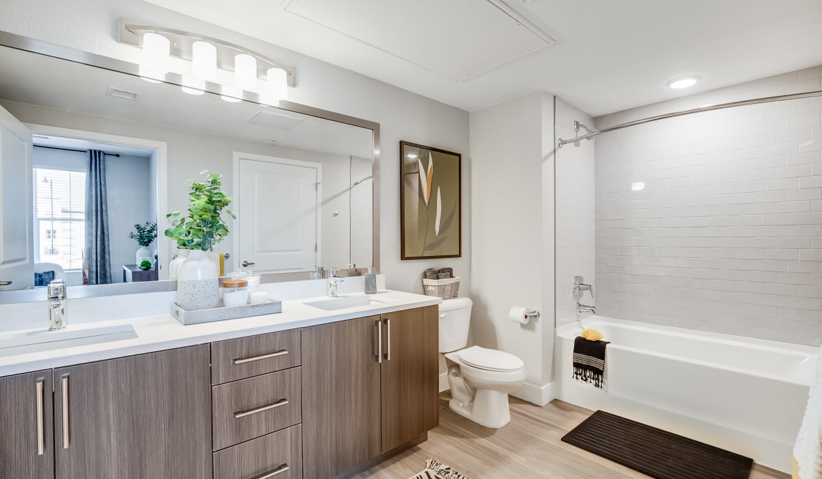 Bathroom with modern details at The Wright Apartments in Centennial, Colorado