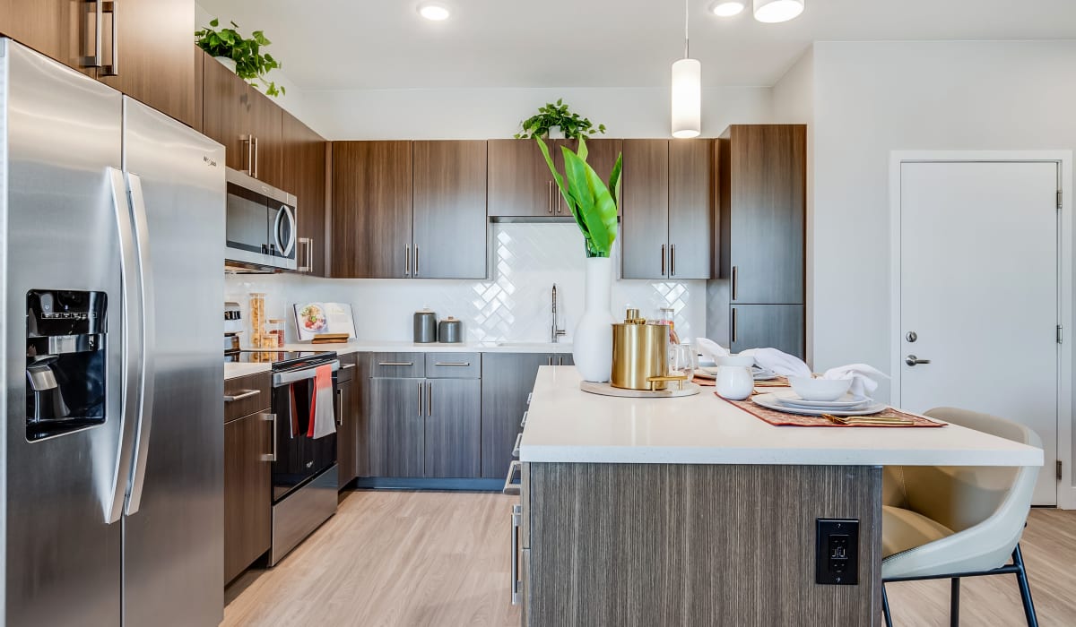 Kitchen with modern cabinets at The Wright Apartments in Centennial, Colorado
