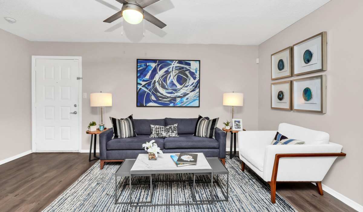 Modern furnished living room with ceiling fan at 4800 Westshore in Tampa, Florida