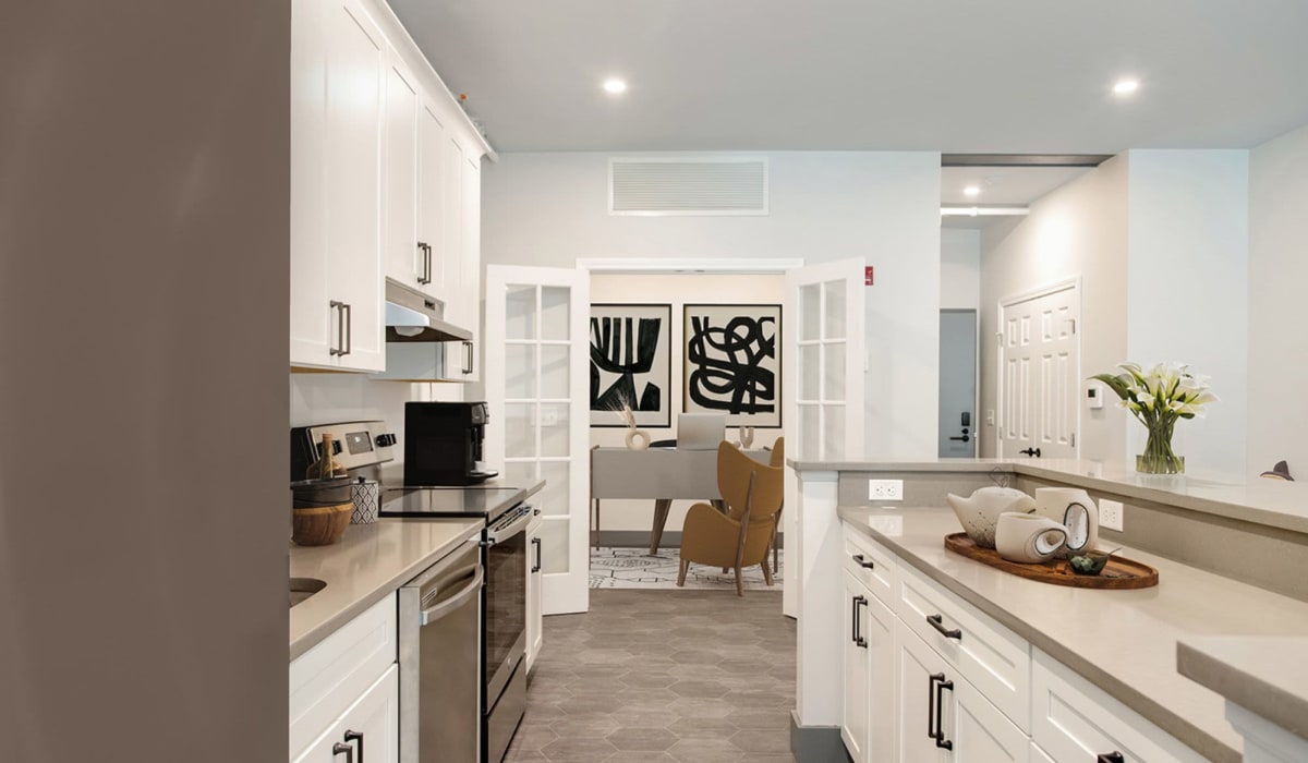Kitchen with modern appliances at The Falls at 124 Water in Leominster, Massachusetts