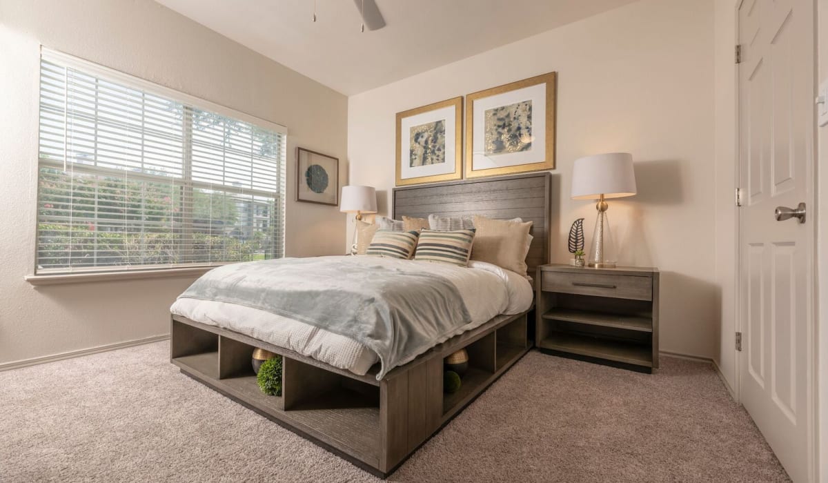 Bedroom with big windows at Sheffield Square in Grand Prairie, Texas