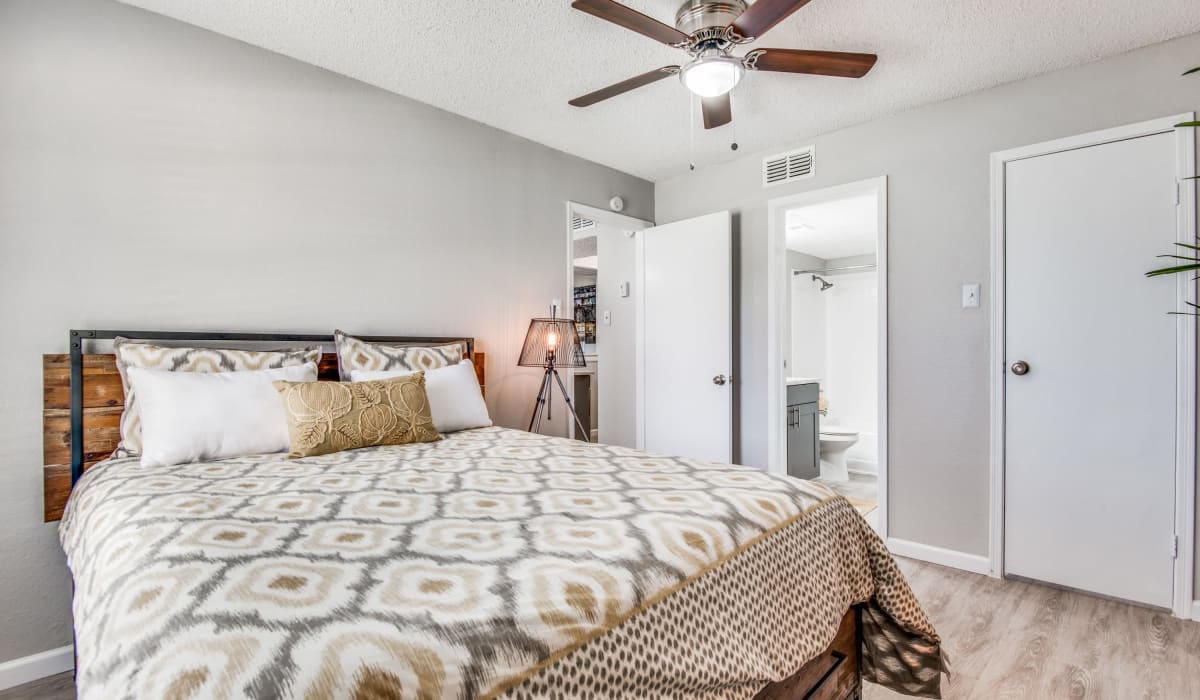 Bedroom with nice bed at Birch Apartment Homes in Dallas, Texas