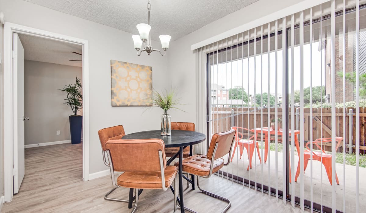 Dining room with chairs at Birch Apartment Homes in Dallas, Texas