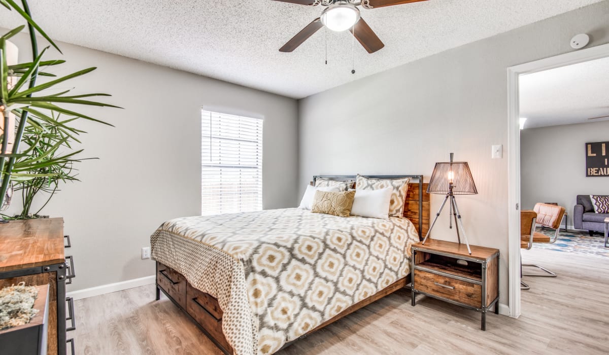 Bedroom with nice bed at Birch Apartment Homes in Dallas, Texas