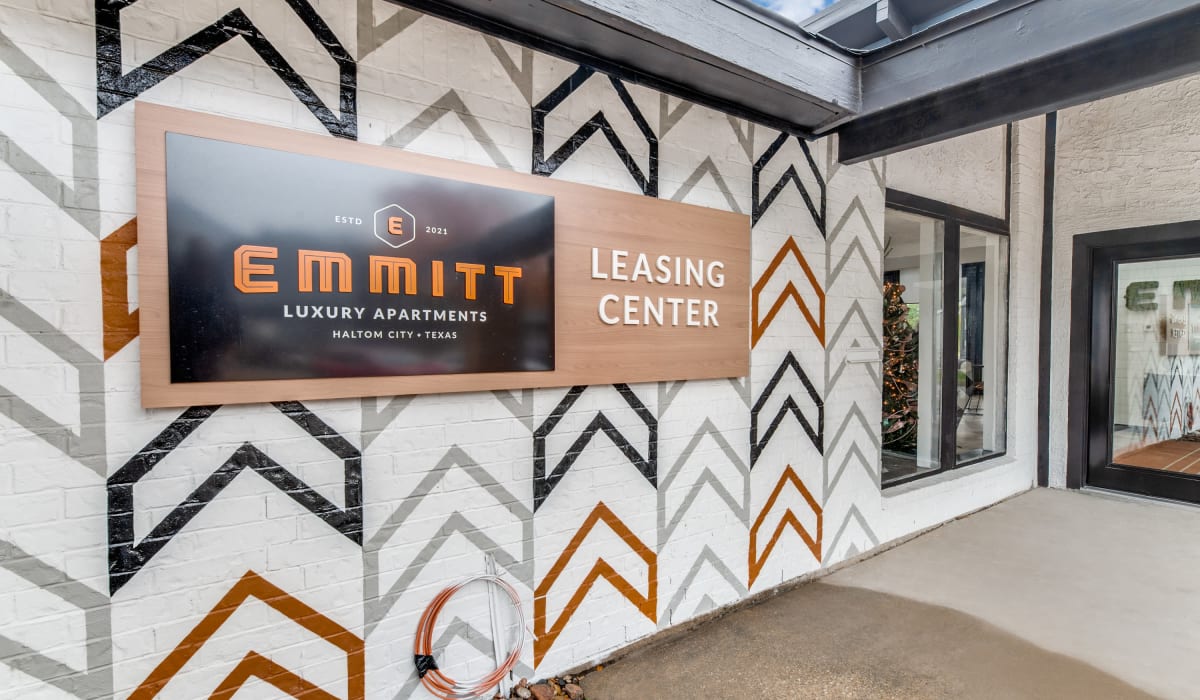 Leasing office sign at  Emmitt Luxury Apartments in Haltom City, Texas