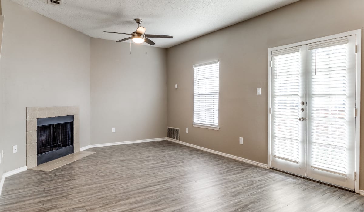 Open living room at Knowlton Apartment Homes in Mesquite, Texas