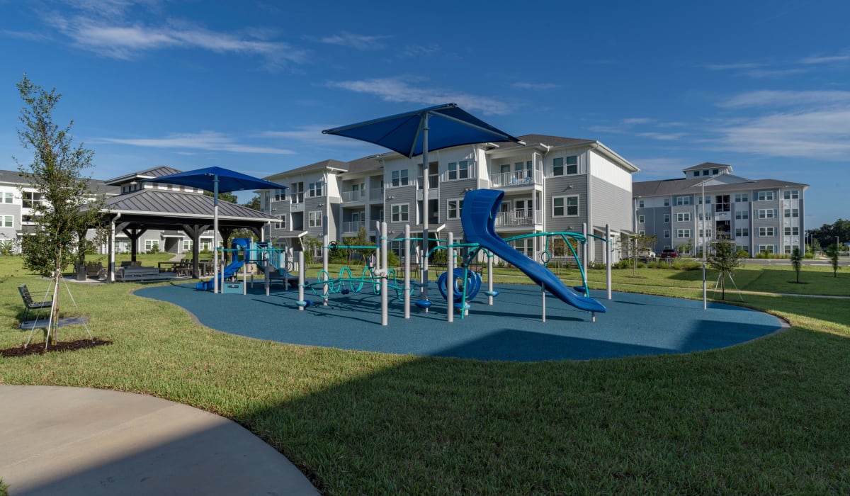 A tiered outdoor playground for children at Sentosa Riverview in Riverview, Florida