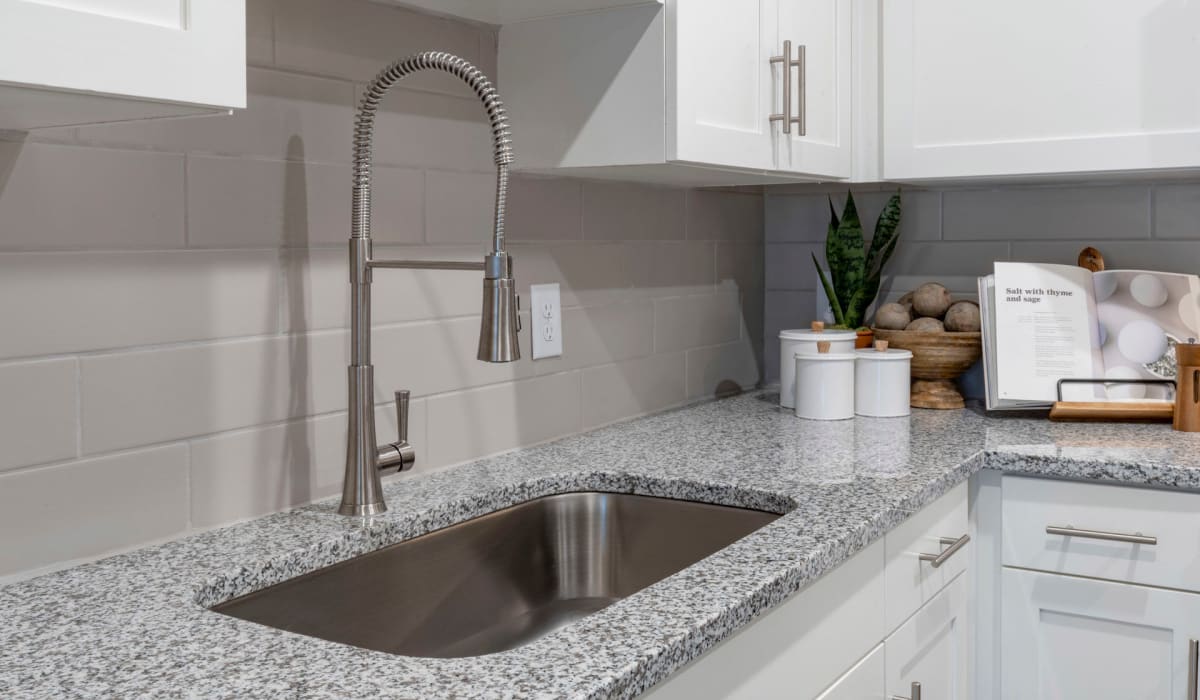 A stainless steel sink in an apartment kitchen at Sentosa Riverview in Riverview, Florida