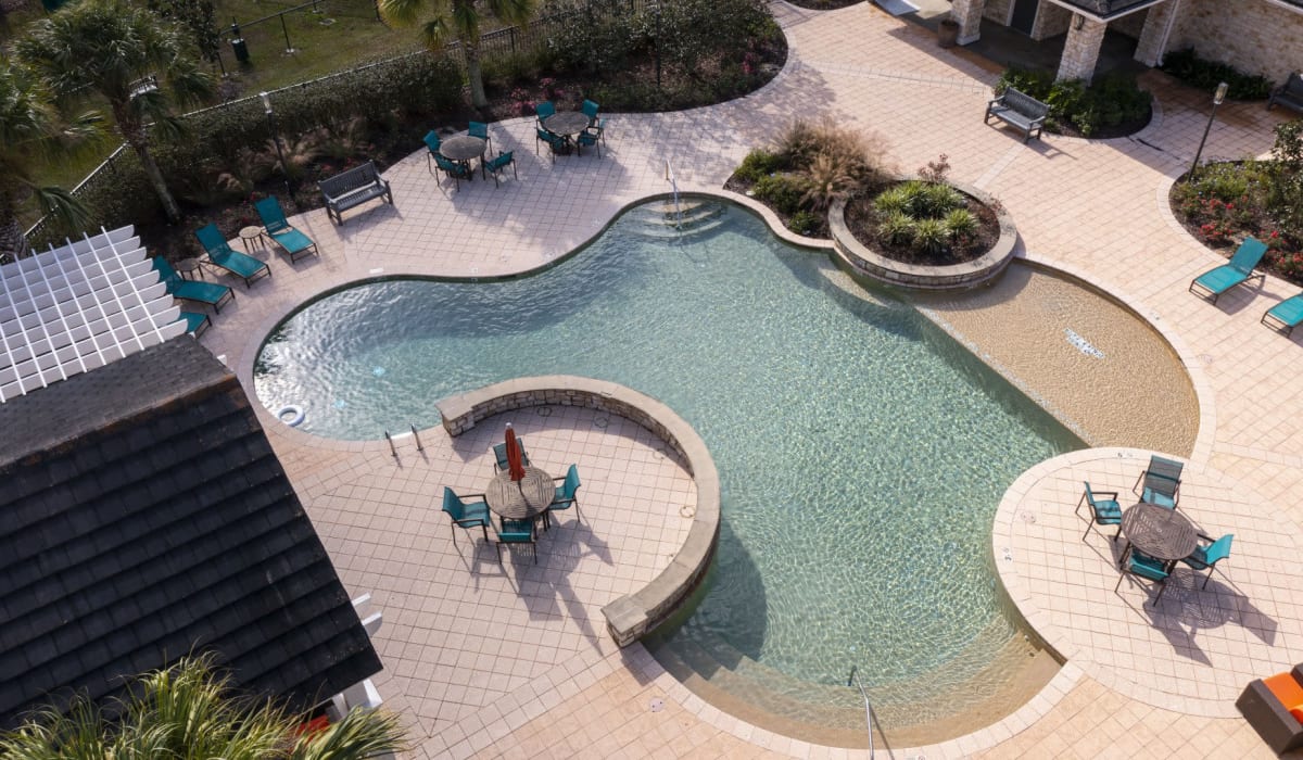 Aerial view of the community swimming pool at Evergreen at Tuscany Villas in Baton Rouge, Louisiana
