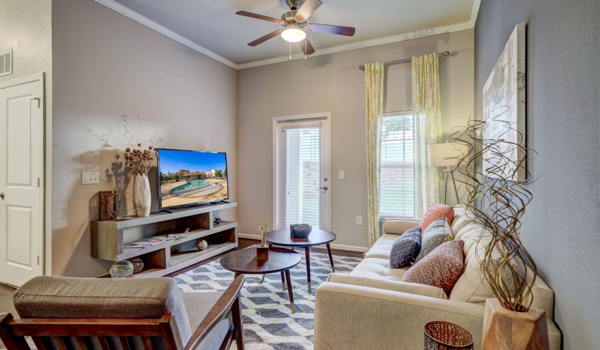 Livingroom with patio door at Creekside at Greenlawn Apartment Homes in Columbia, South Carolina