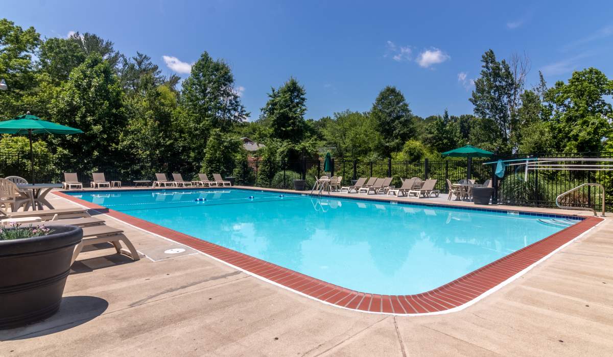 Pool area with lounge chairs at Landmark at Patterson in Richmond, Virginia 