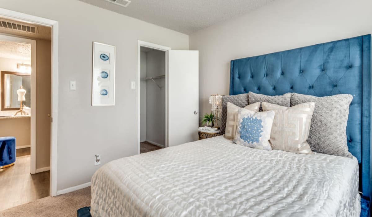 Spacious bedroom with master bath at  Emmitt Luxury Apartments in Haltom City, Texas