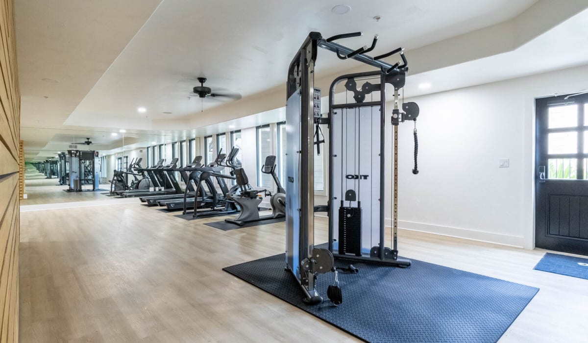 Treadmills and weight lifting equipment in the fitness center at Legends Lakeline in Austin, Texas