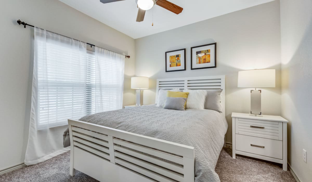 Bedroom with cozy bed at Alannah at Westover Hills in San Antonio, Texas