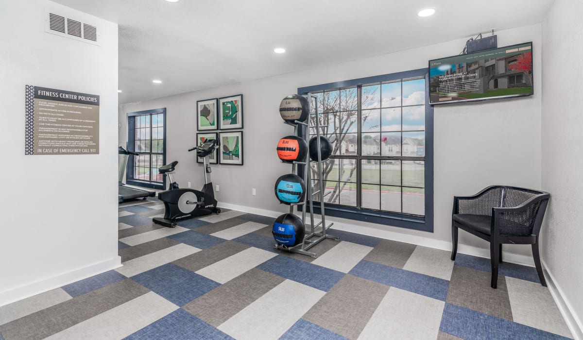 Medicine balls in fitness center at Fiona Apartment Homes in Irving, Texas
