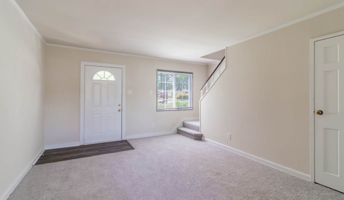 front door of empty apartment at Hilliard Road Apartments in Richmond, Virginia