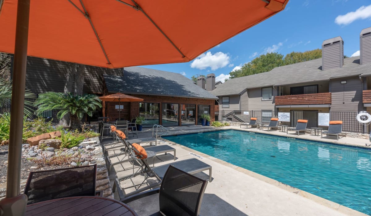 Pool with umbrella at Grace Woods in Austin, Texas