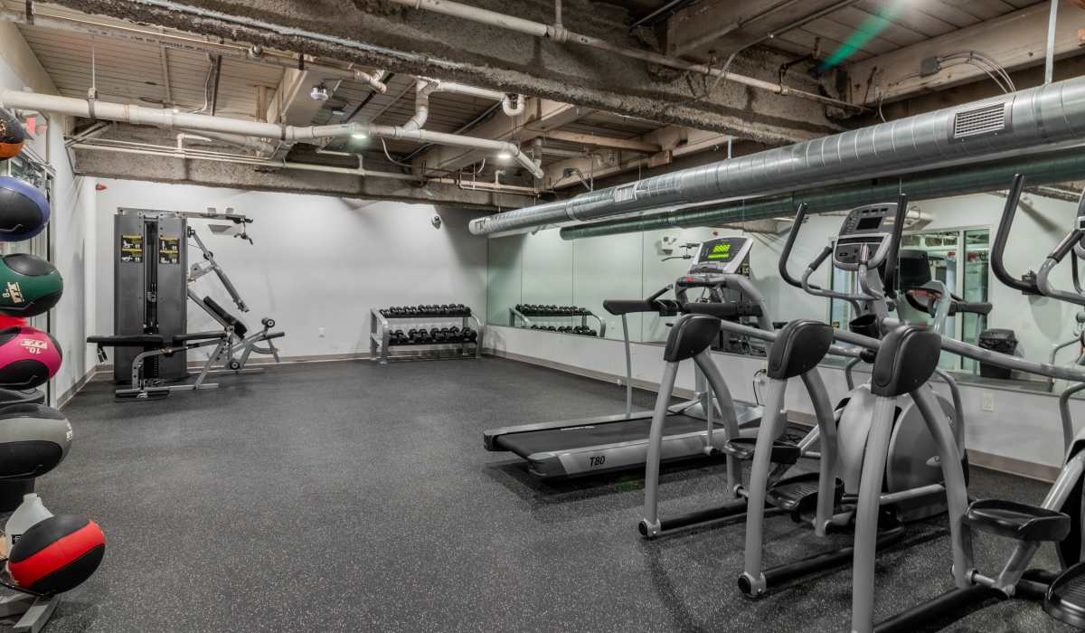 Cardio machines in the fitness center at Broadway Apartments in Richmond, Virginia