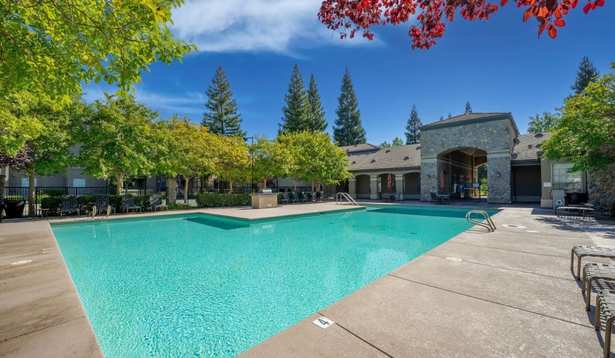 Swimming pool at Cobble Oaks Apartments in Gold River, California