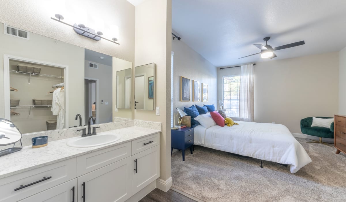 Bedroom with open concept vanity area at Cobble Oaks Apartments in Gold River, California