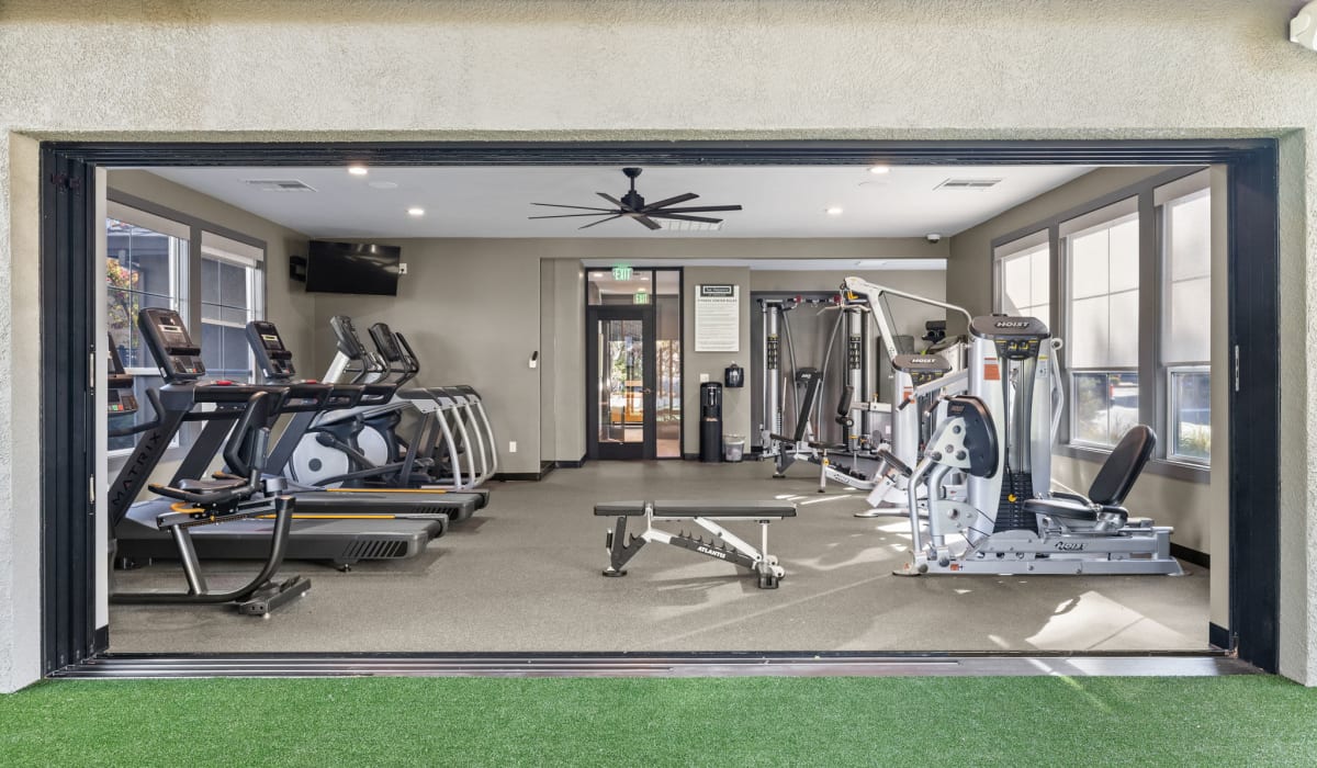 Fitness center with garage door at The Preserve at Creekside in Roseville, California