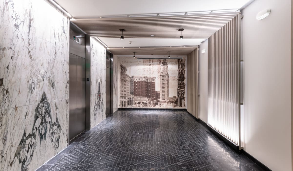 Apartment lobby and elevators at One India Street Apartments in Boston, Massachusetts