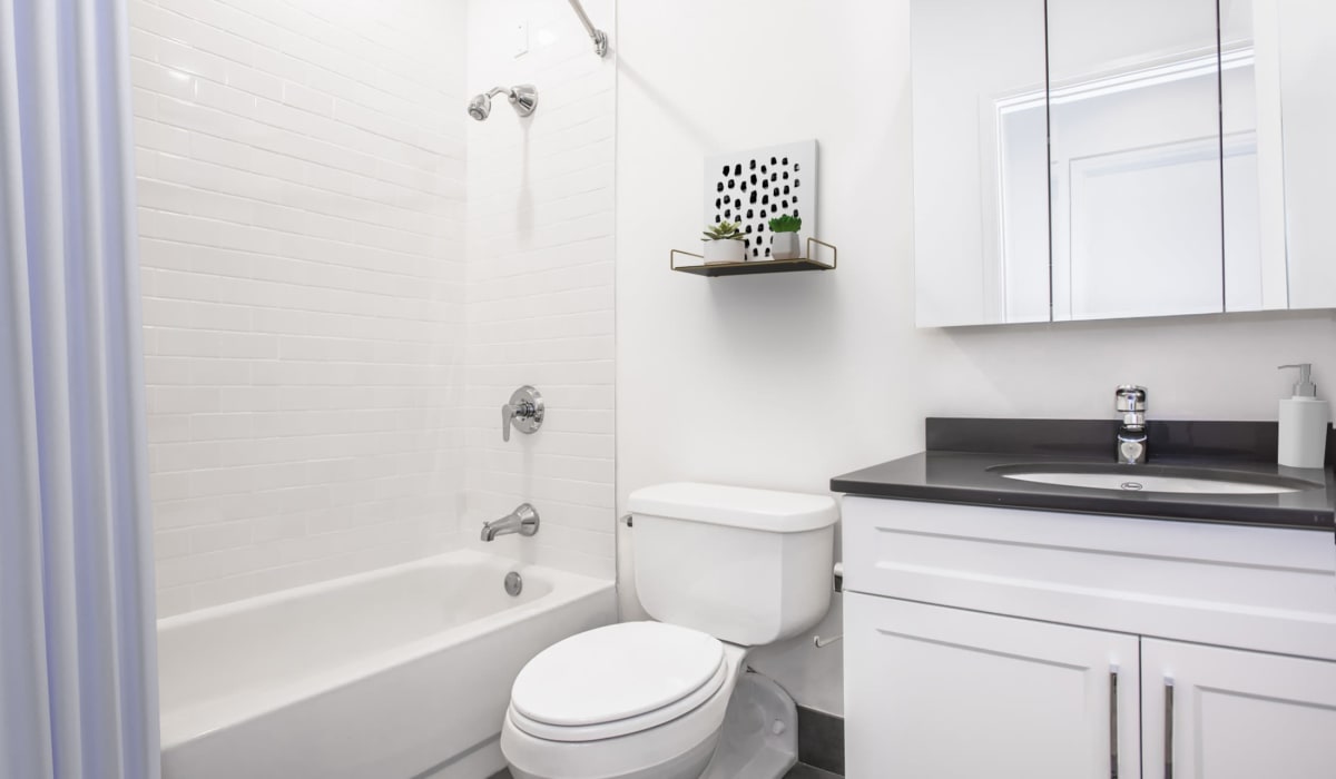 Apartment bathroom with full bath and shower at One India Street Apartments in Boston, Massachusetts