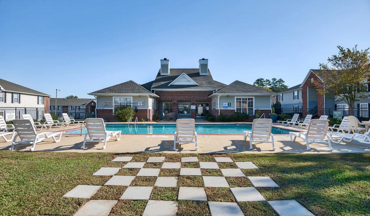 An outdoor chess board beside the swimming pool at Reserve at Stillwater in Durham, North Carolina