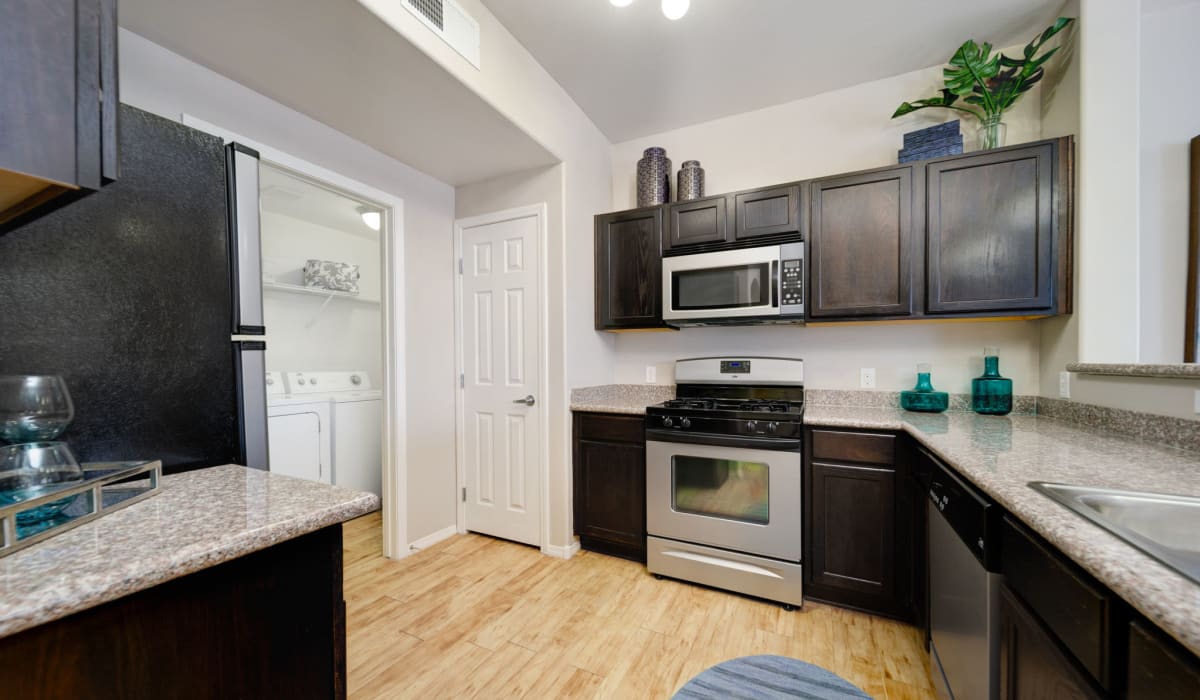 Kitchen with stainless-steel appliances at The Trails at Pioneer Meadows in Sparks, Nevada