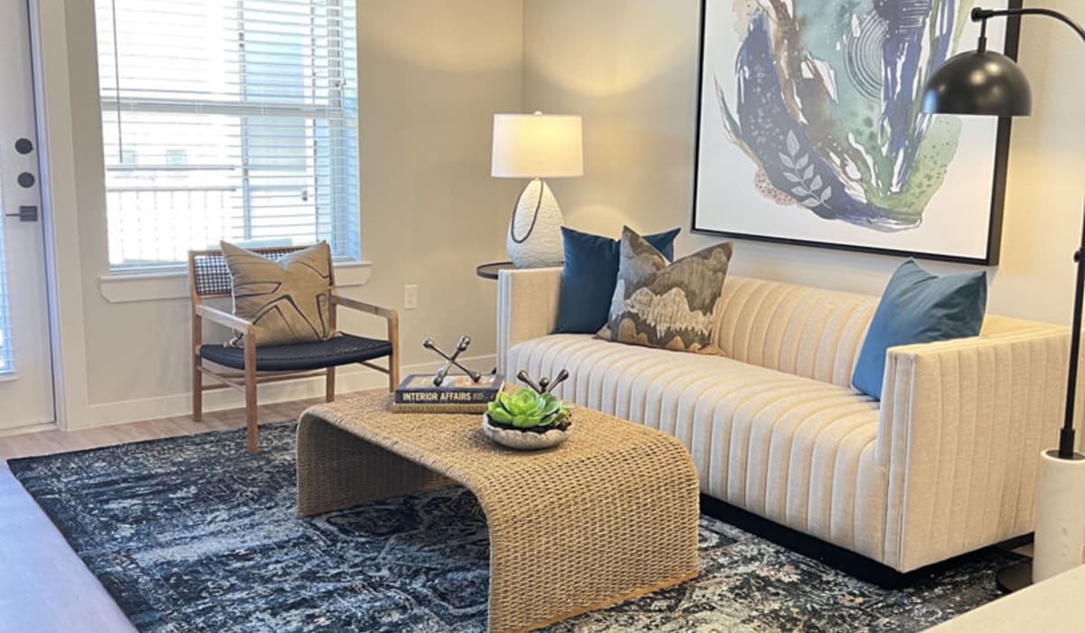 Living room with vintage furnishings at Define Living at Brittmoore in Houston, Texas