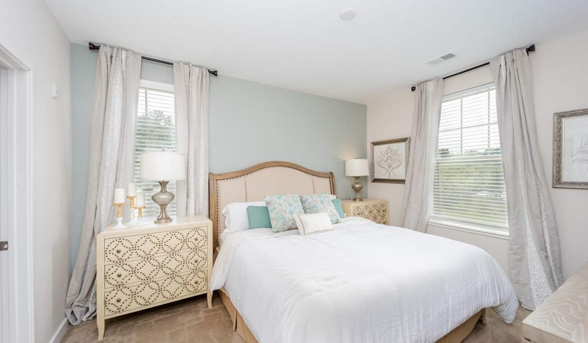 Bedroom with plush carpeting at Lane Parke Apartments in Mountain Brook, Alabama