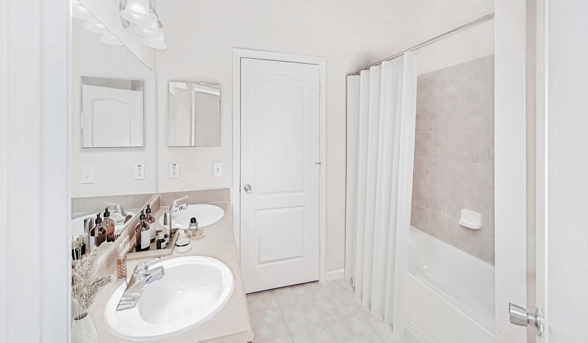 Bathroom sink at Heritage on Millenia Apartments in Orlando, Florida