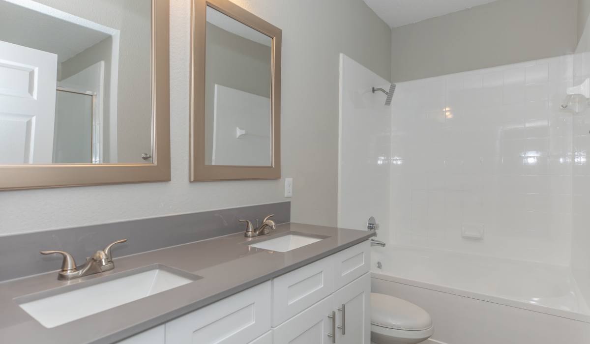 A renovated bathroom in a model home at Devi at Valley Ranch in Irving, Texas