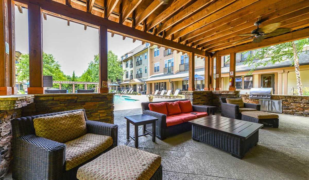Covered outdoor gathering spaces at The Reserve at Johns Creek Walk in Johns Creek, Georgia