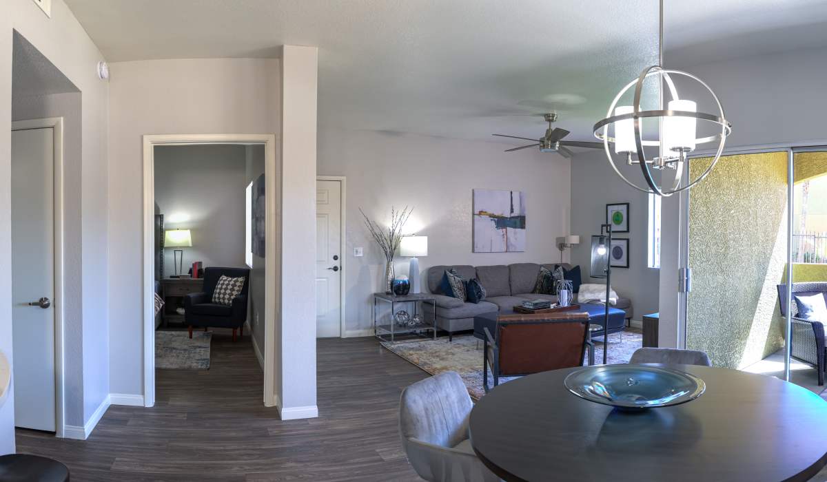 View of the dining room and living room at La Serena at the Heights in Henderson, Nevada