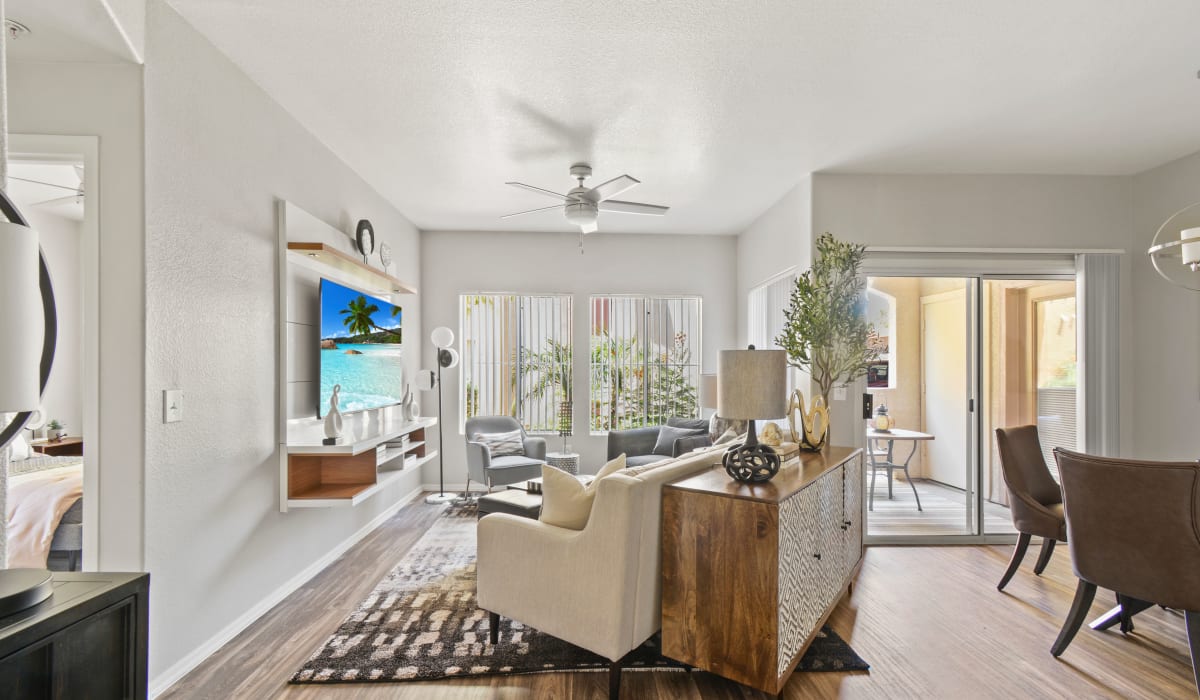 Modern living room with wood floors at La Serena at Toscana in Phoenix, Arizona