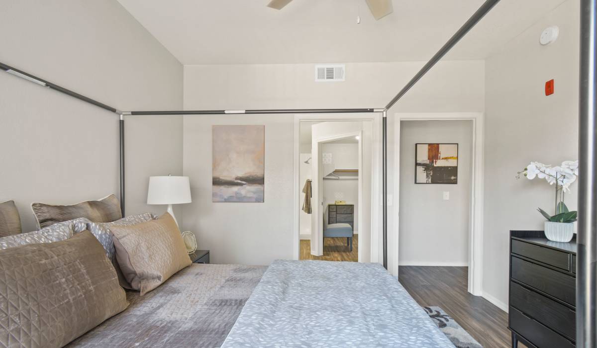 Model bedroom with a dresser at La Serena at Toscana in Phoenix, Arizona