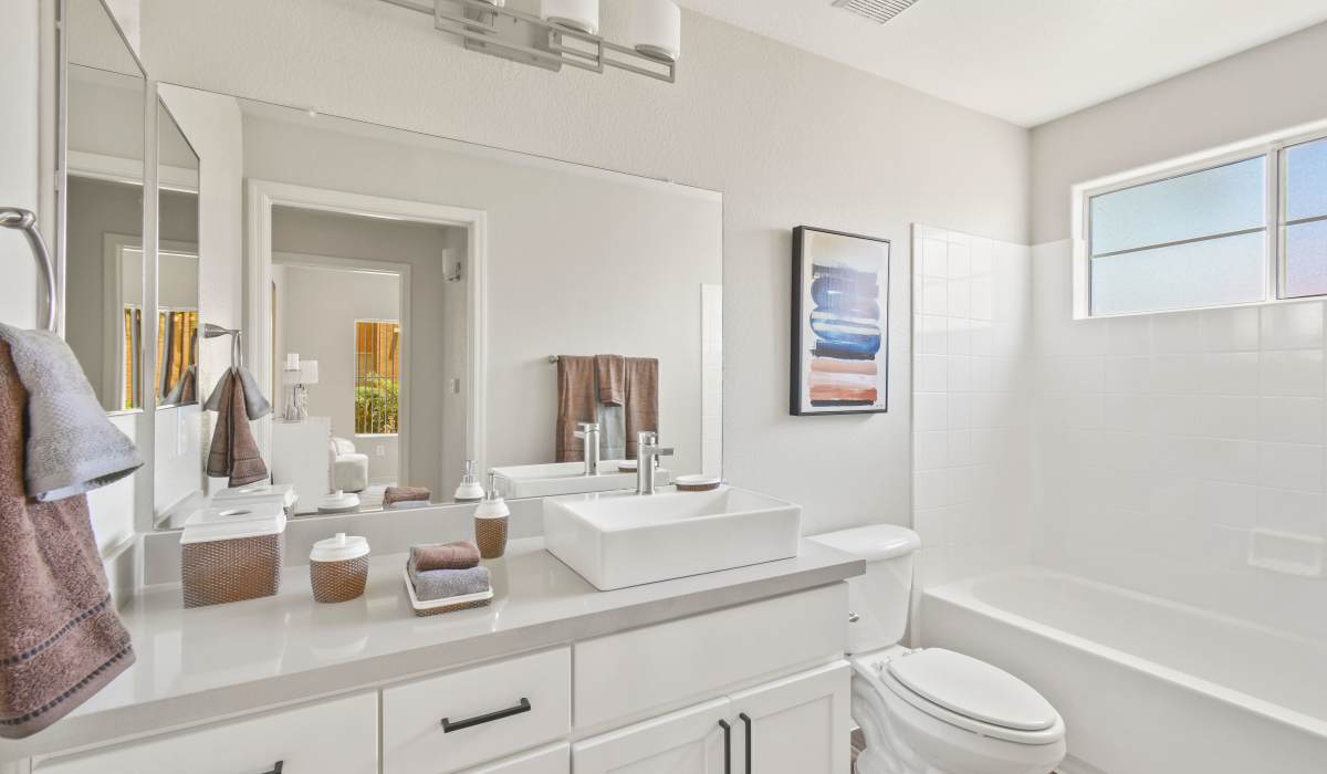 Modern bathroom with white walls at La Serena at Toscana in Phoenix, Arizona