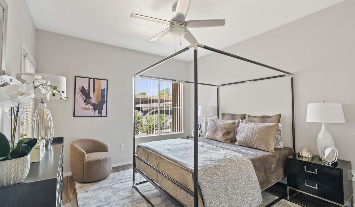 Master bedroom with a large rug at La Serena at Toscana in Phoenix, Arizona