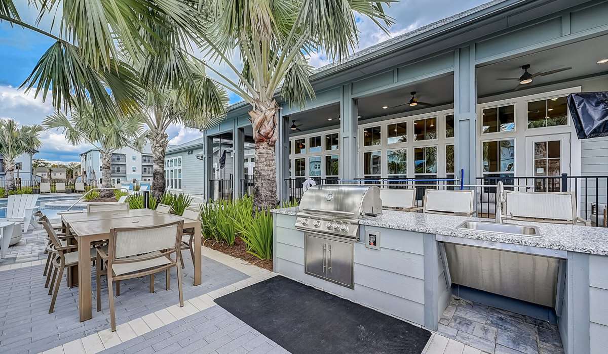 An outdoor grilling station near the swimming pool at Avocet at Melbourne in Melbourne, Florida