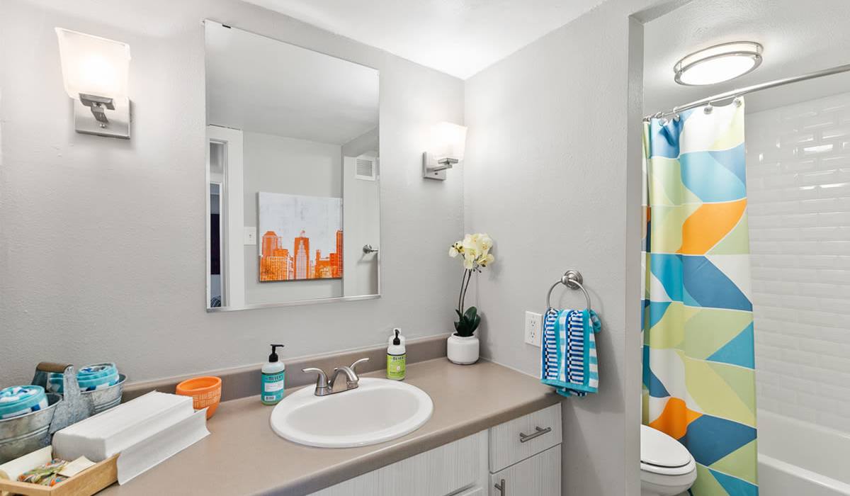 Modern finishes in an apartment bathroom at The Pearl at Midtown in Dallas, Texas