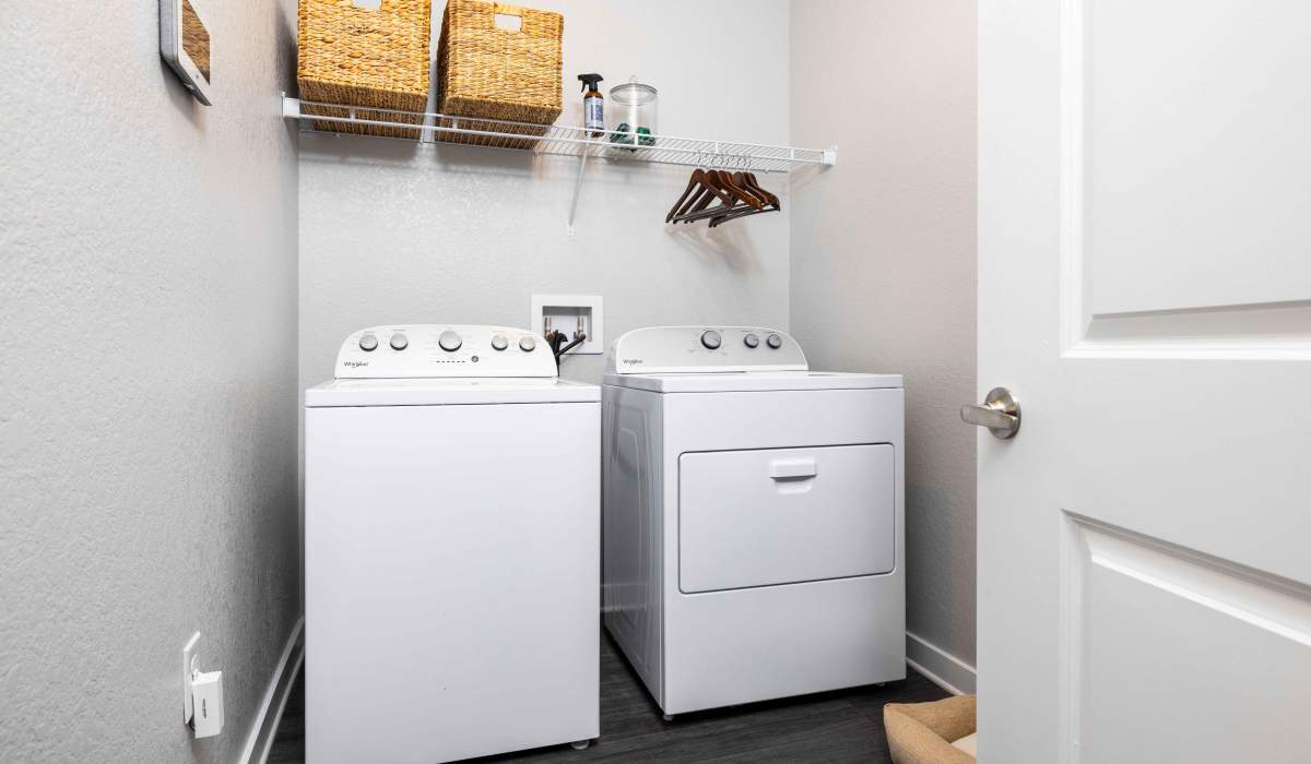 In-home washer and dryer in a model home at Collins Preserve in Jacksonville, Florida