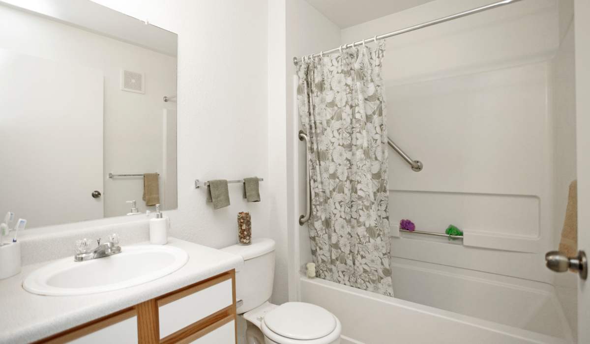 Bath with standard shower at North Oak Crossing in Kansas City, Missouri